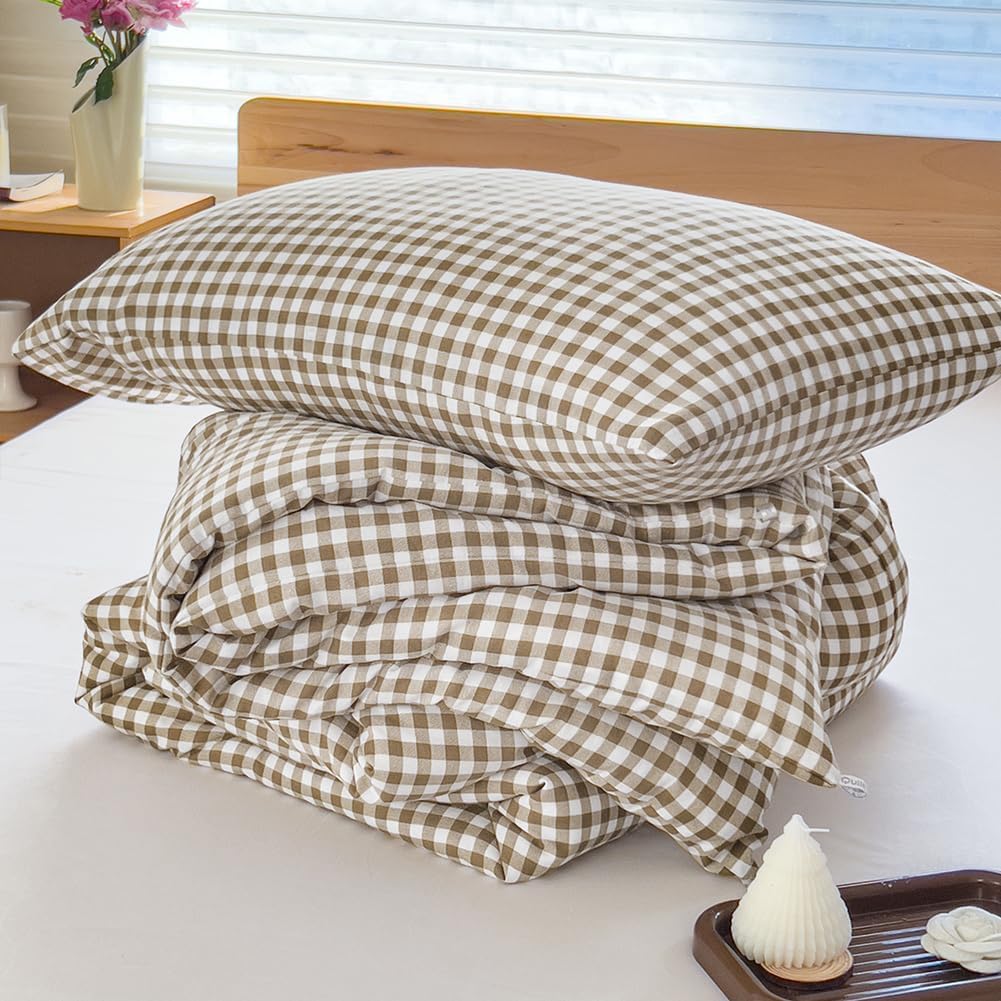 NSNLGSGC tan gingham bed setup enhances timeless charm in the bedroom.