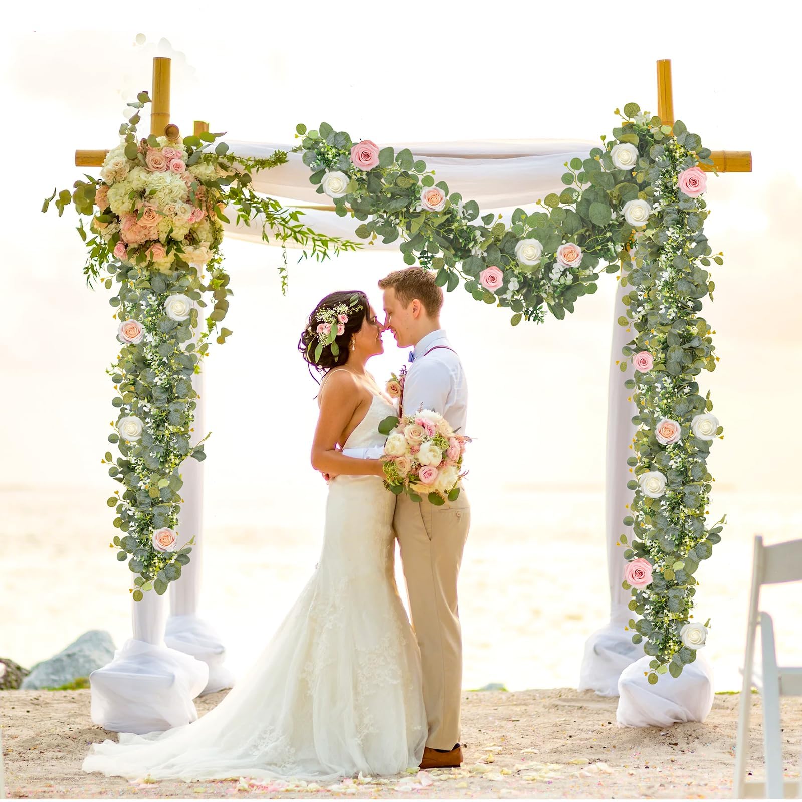 N&T NIETING eucalyptus garland with white blooms adds subtle contrast