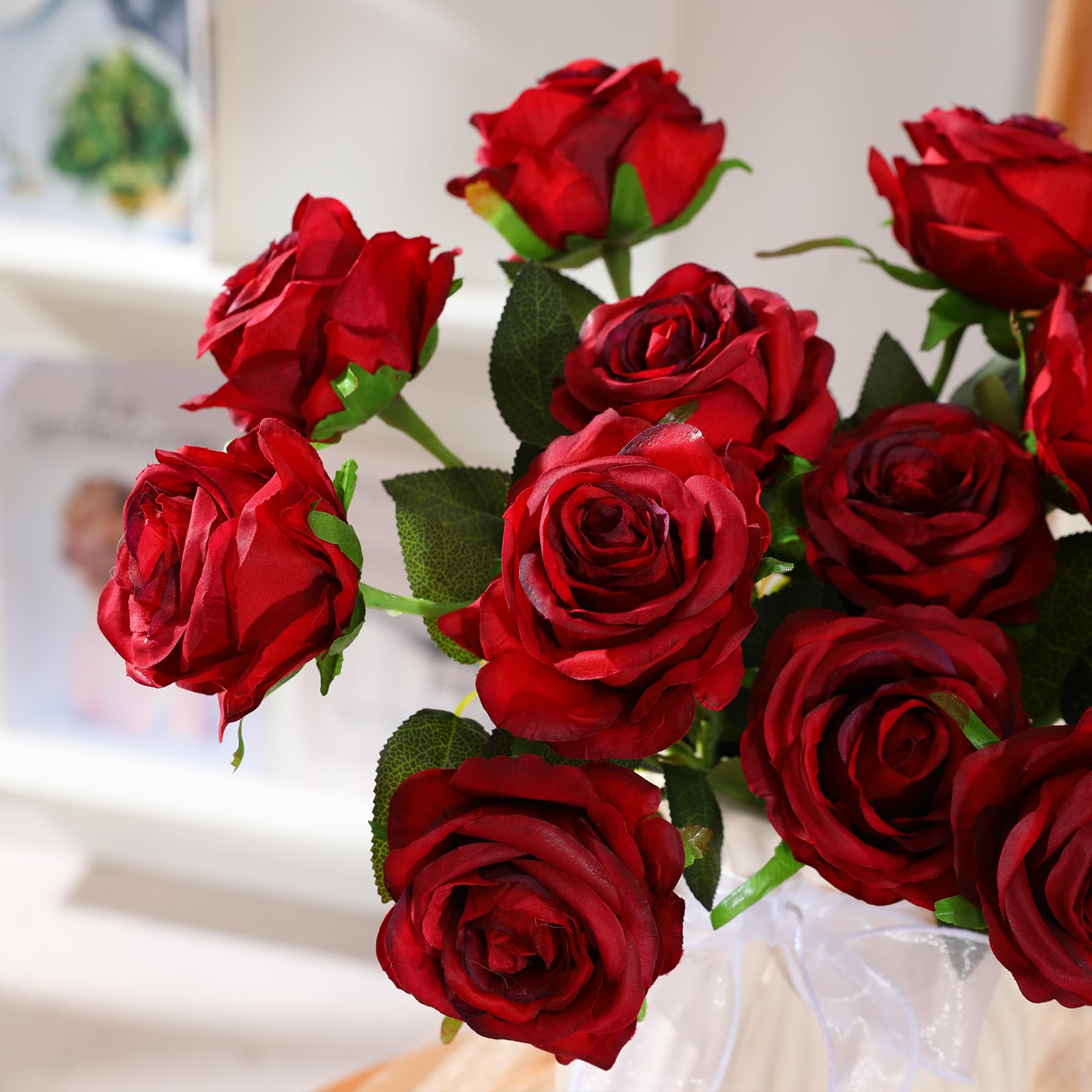 Nubry romantic outdoor display with weather-friendly artificial roses.