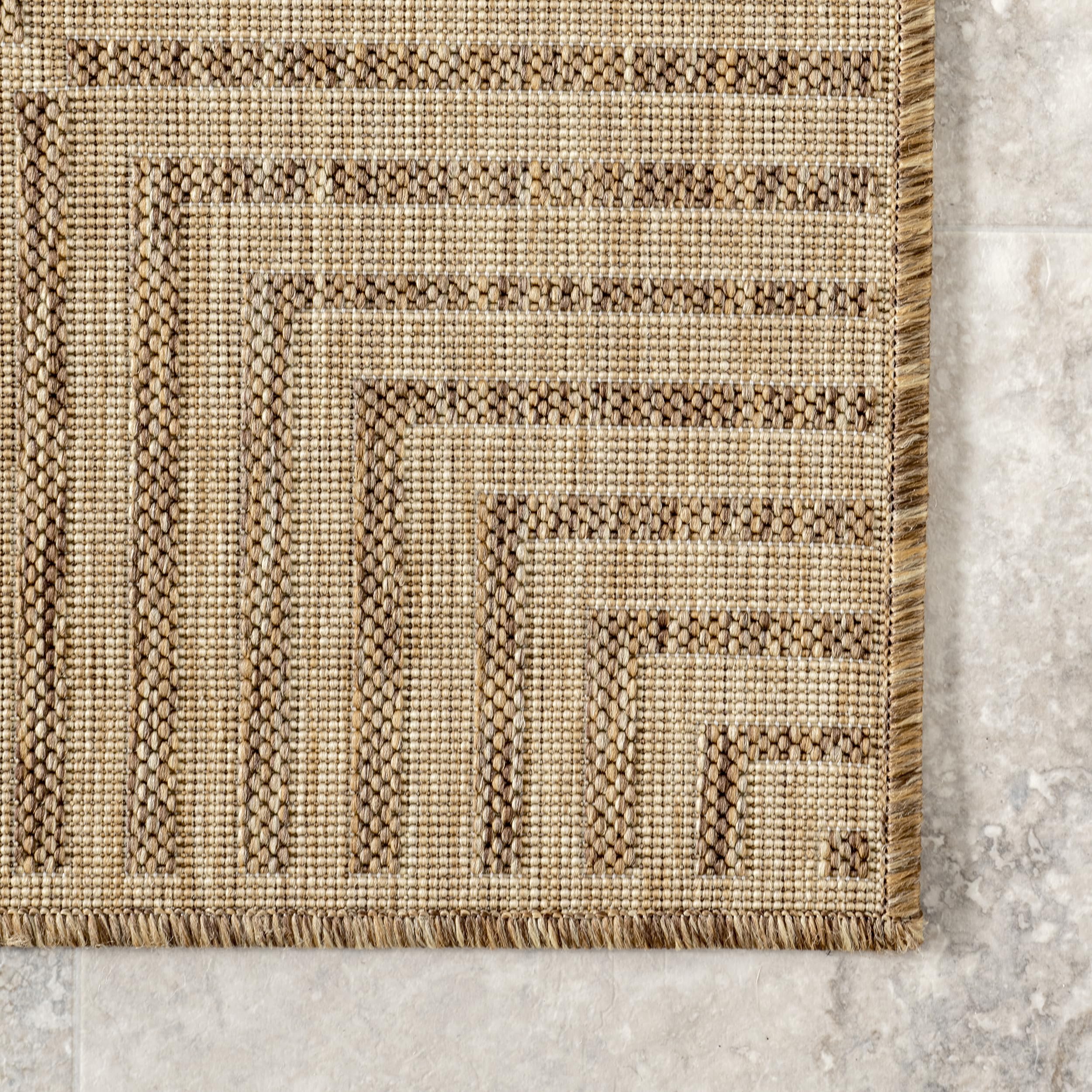 nuLOOM Asha indoor-outdoor placement highlights stain resistance in high-traffic areas