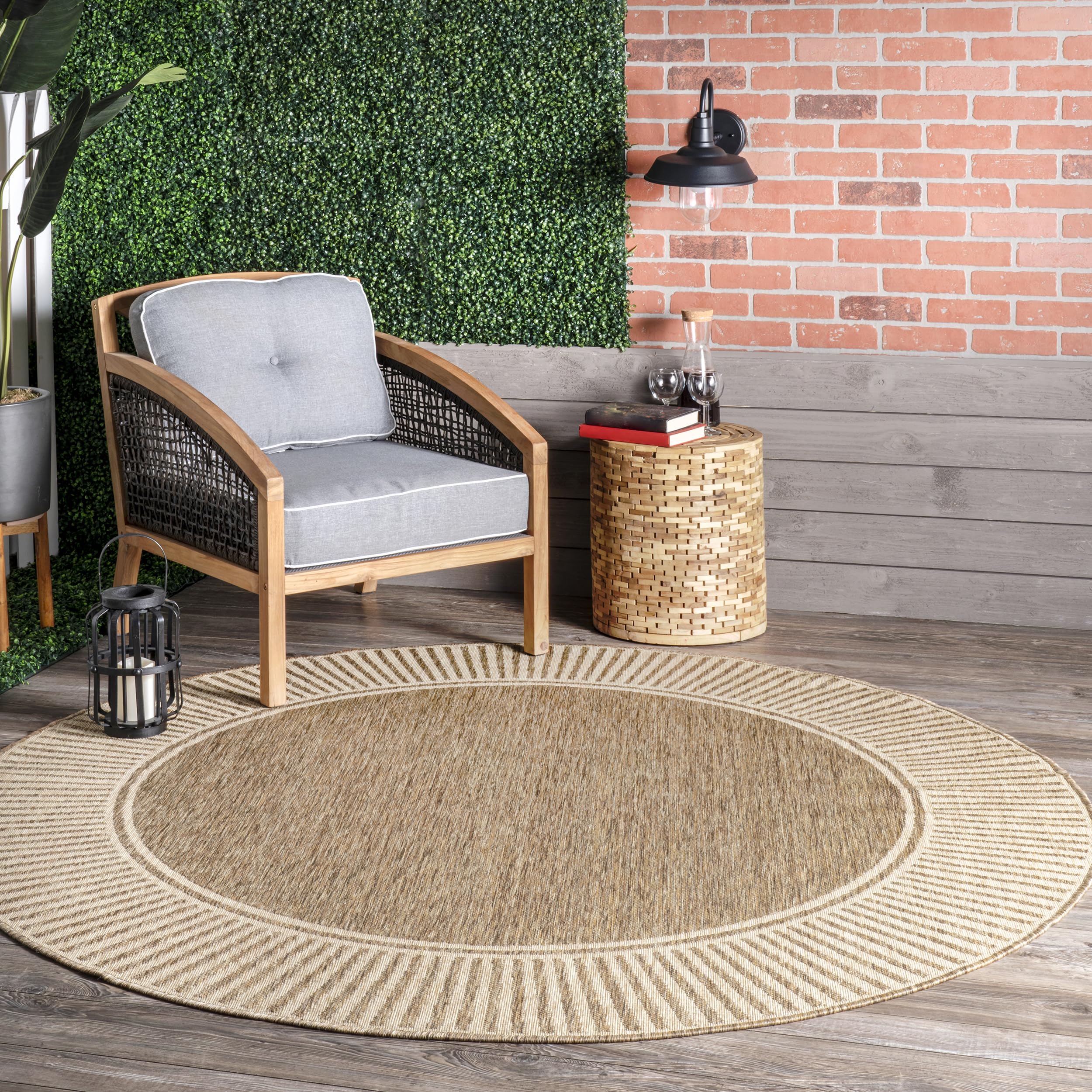 nuLOOM Asha border-striped round rug defines outdoor seating areas