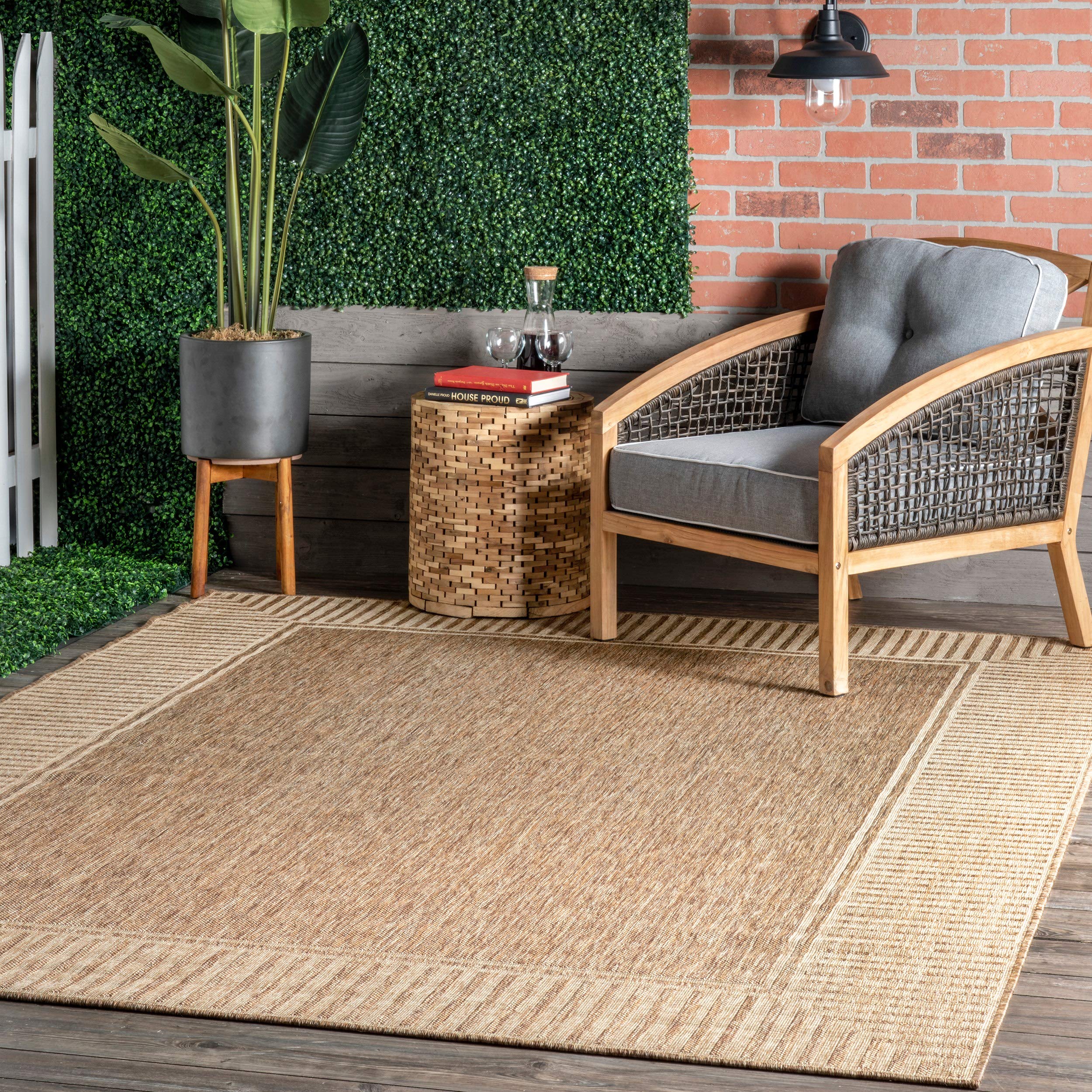 nuLOOM Asha indoor/outdoor rug 5x8 with striped border; durable for patio use.
