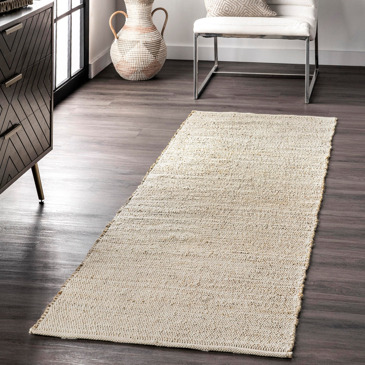 nuLOOM Elfriede braided jute cotton closeup shows texture and natural warmth for living spaces.