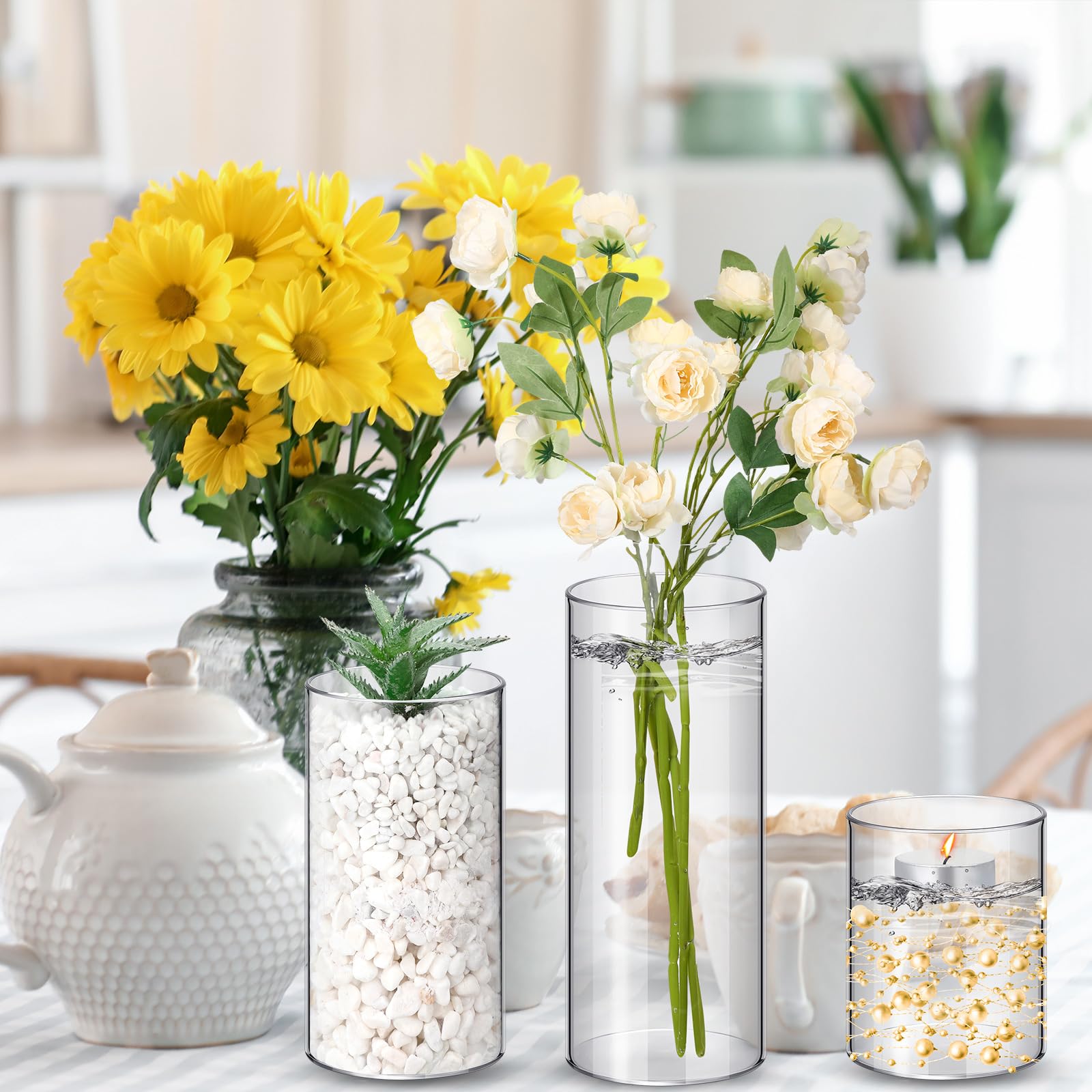 Nuogo wedding and event decor setup with clear vases for tables and mantels.