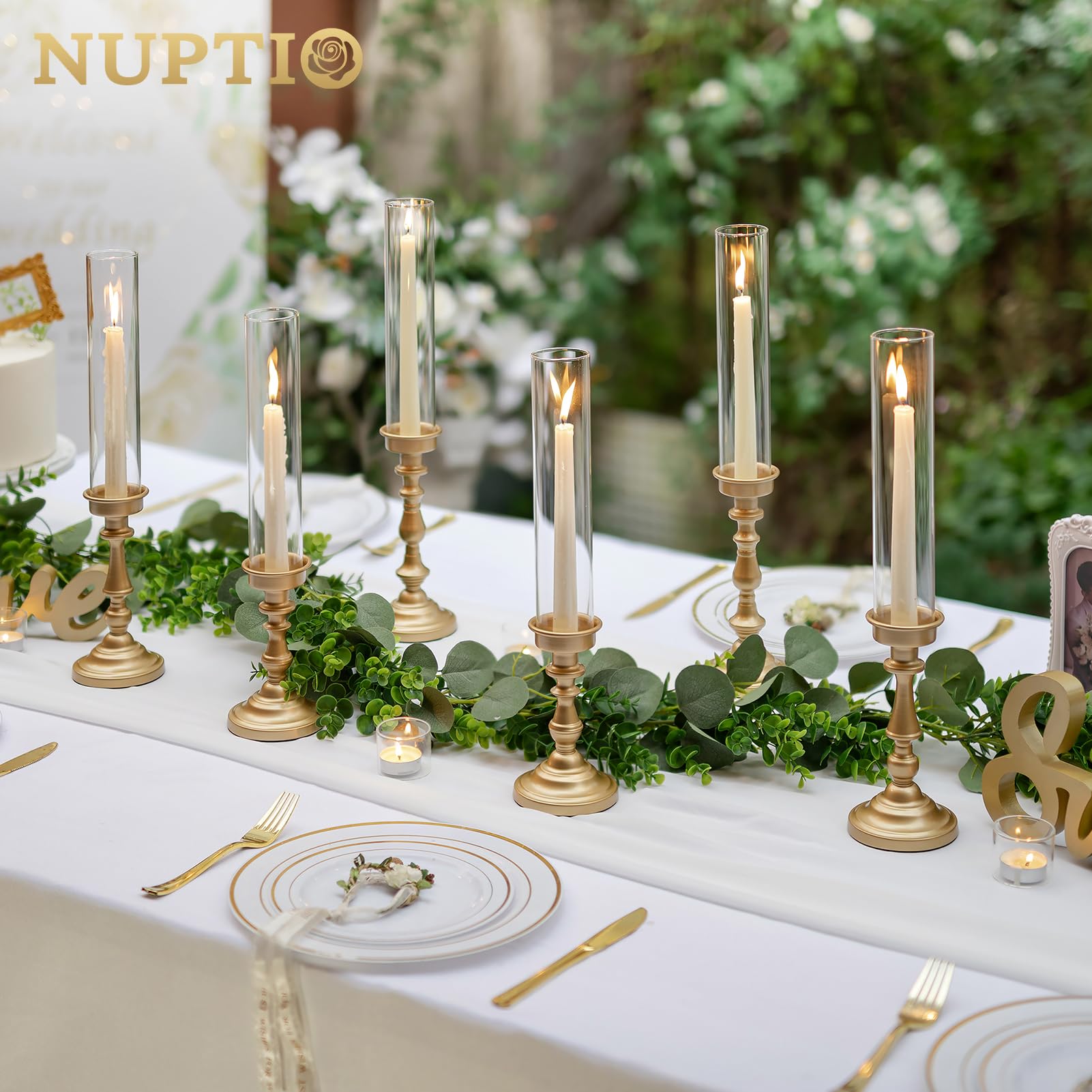 NUPTIO gold candlestick holders in three sizes ideal for varied centerpieces.