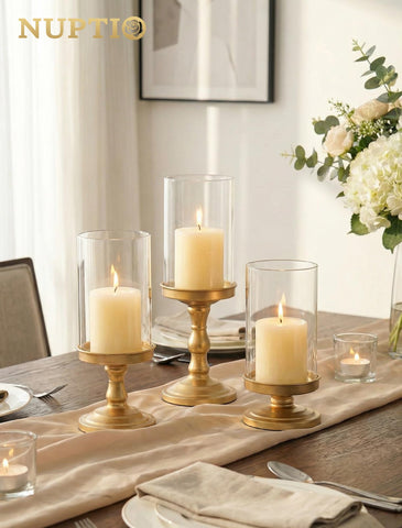 Nuptio hurricane glass candle holder tall pillar creates layered height on tables.
