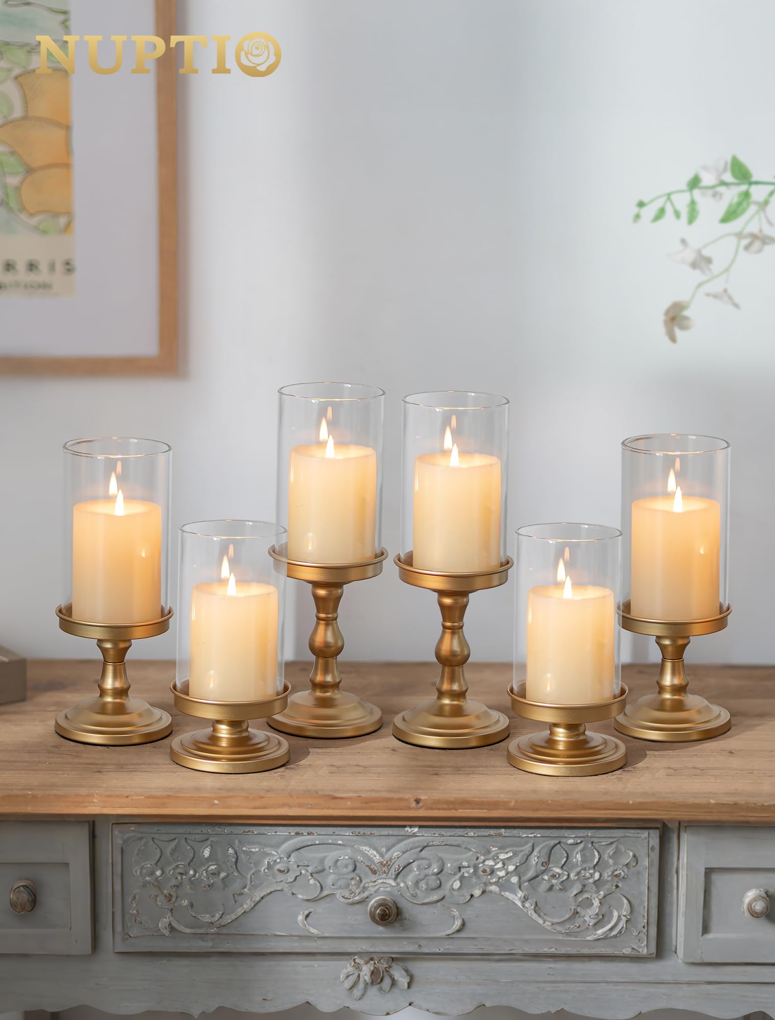 Nuptio hurricane glass candle holder set elevates dining table centerpiece.