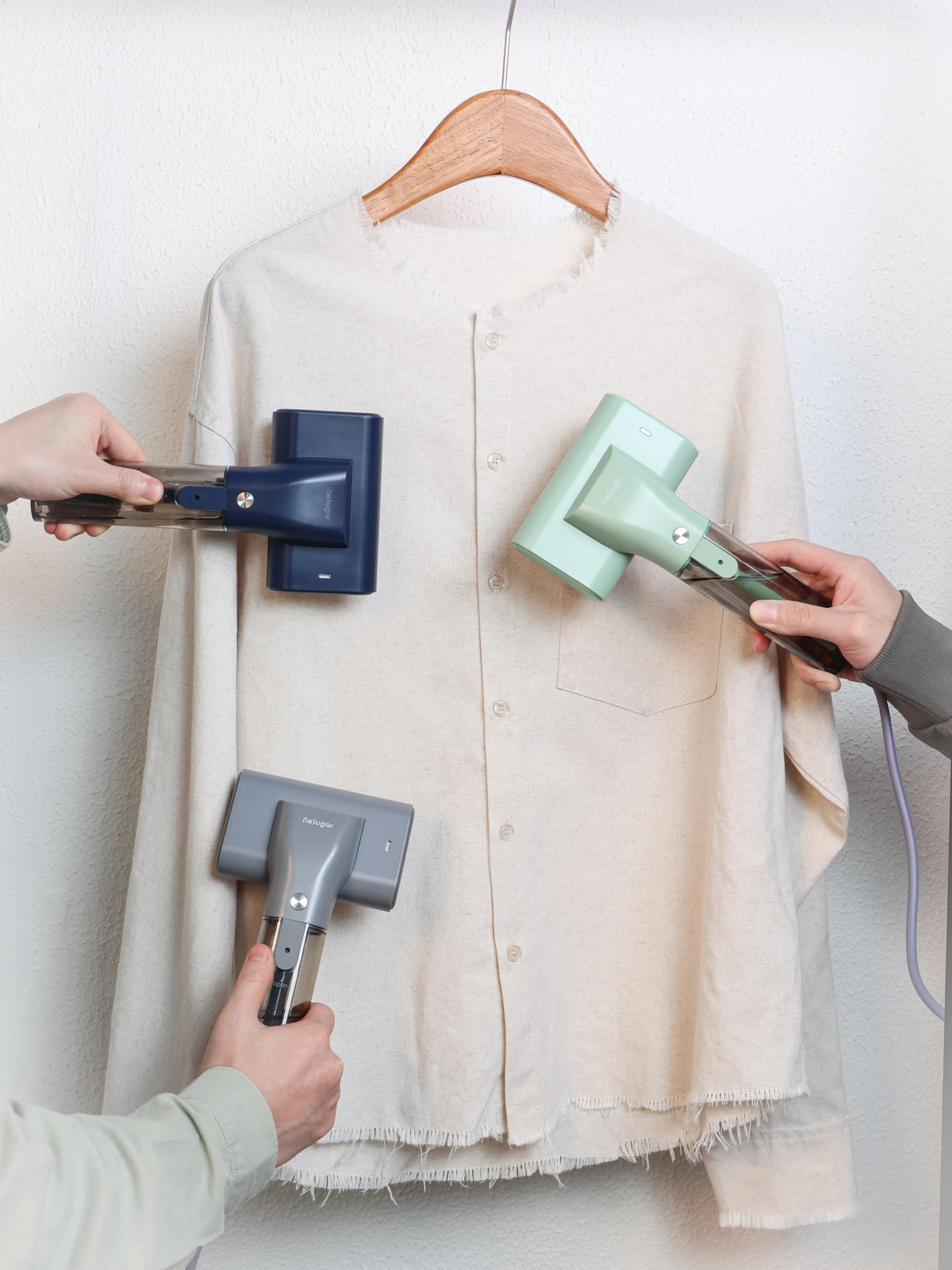 nxuoo G10 Pro Travel Steamer in use on clothing during travel.