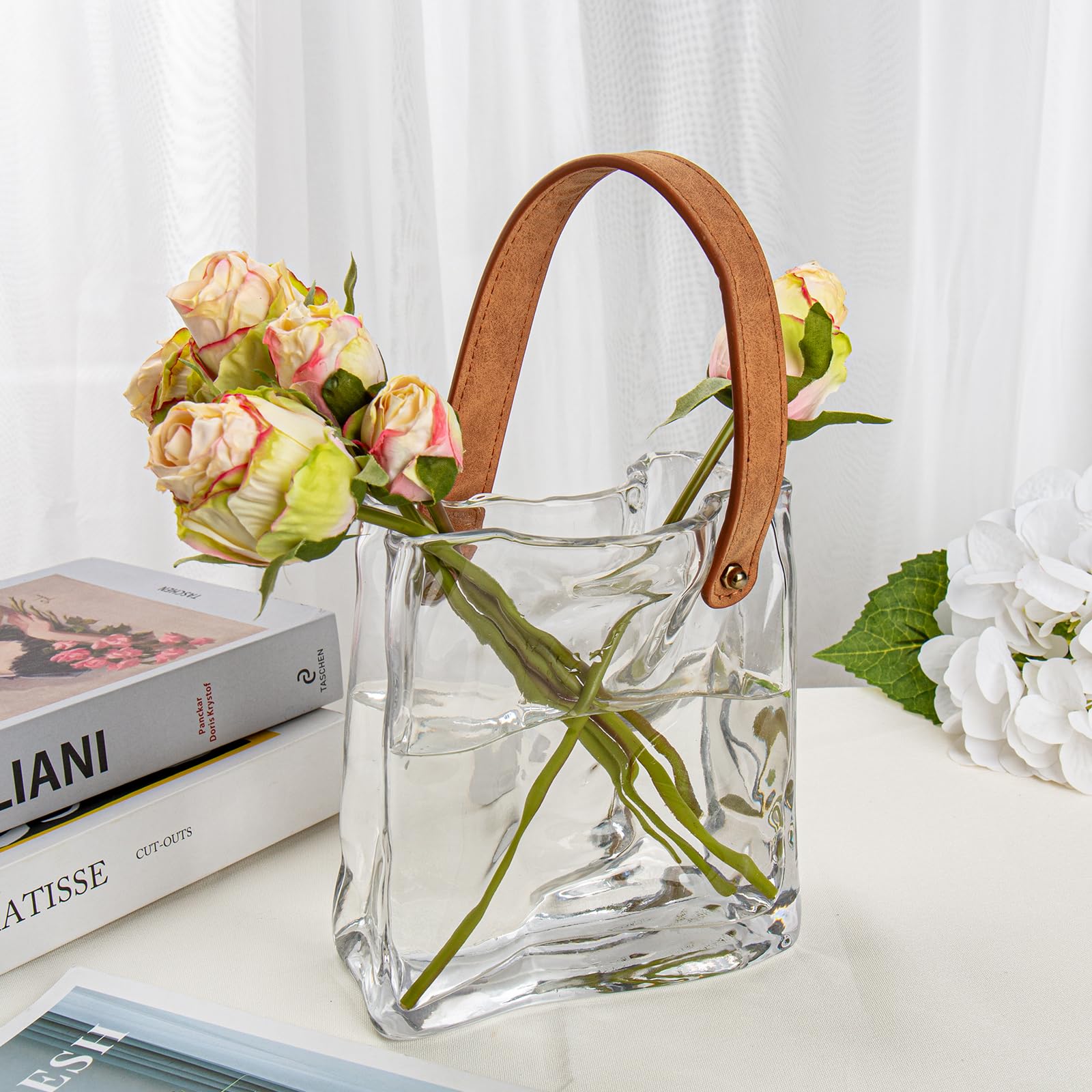 Oairse purse vase side view highlights authentic leather handle and elegant silhouette.