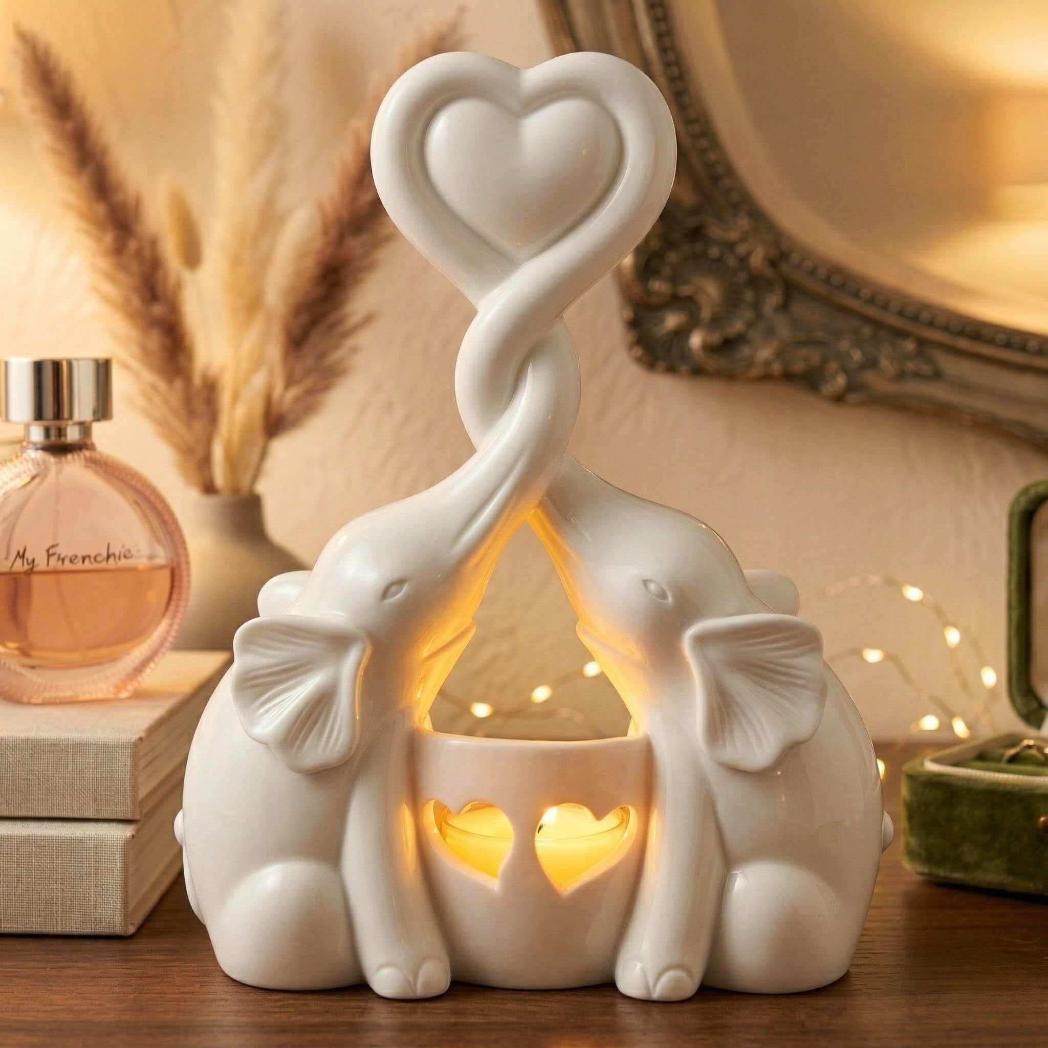 OakiWay Elephant Love Candle Holder in ivory, a romantic living room centerpiece.