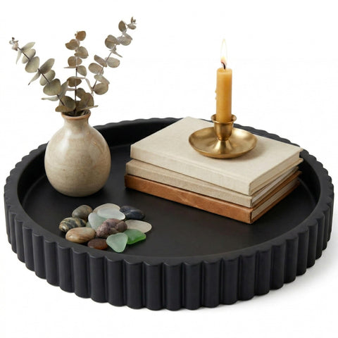 OAKOA round black concrete tray, perfect as a stylish coffee table centerpiece.