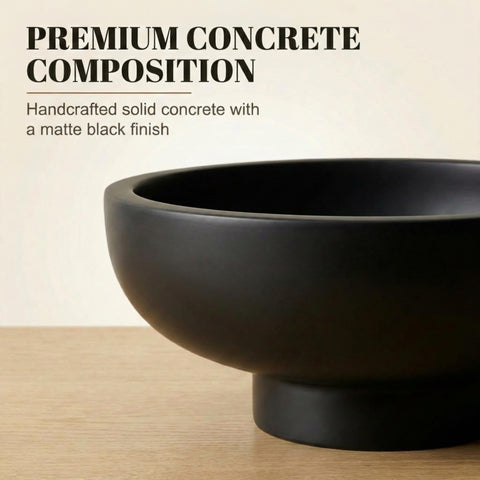 OAKOA concrete bowl used for fruit display or decorative storage.