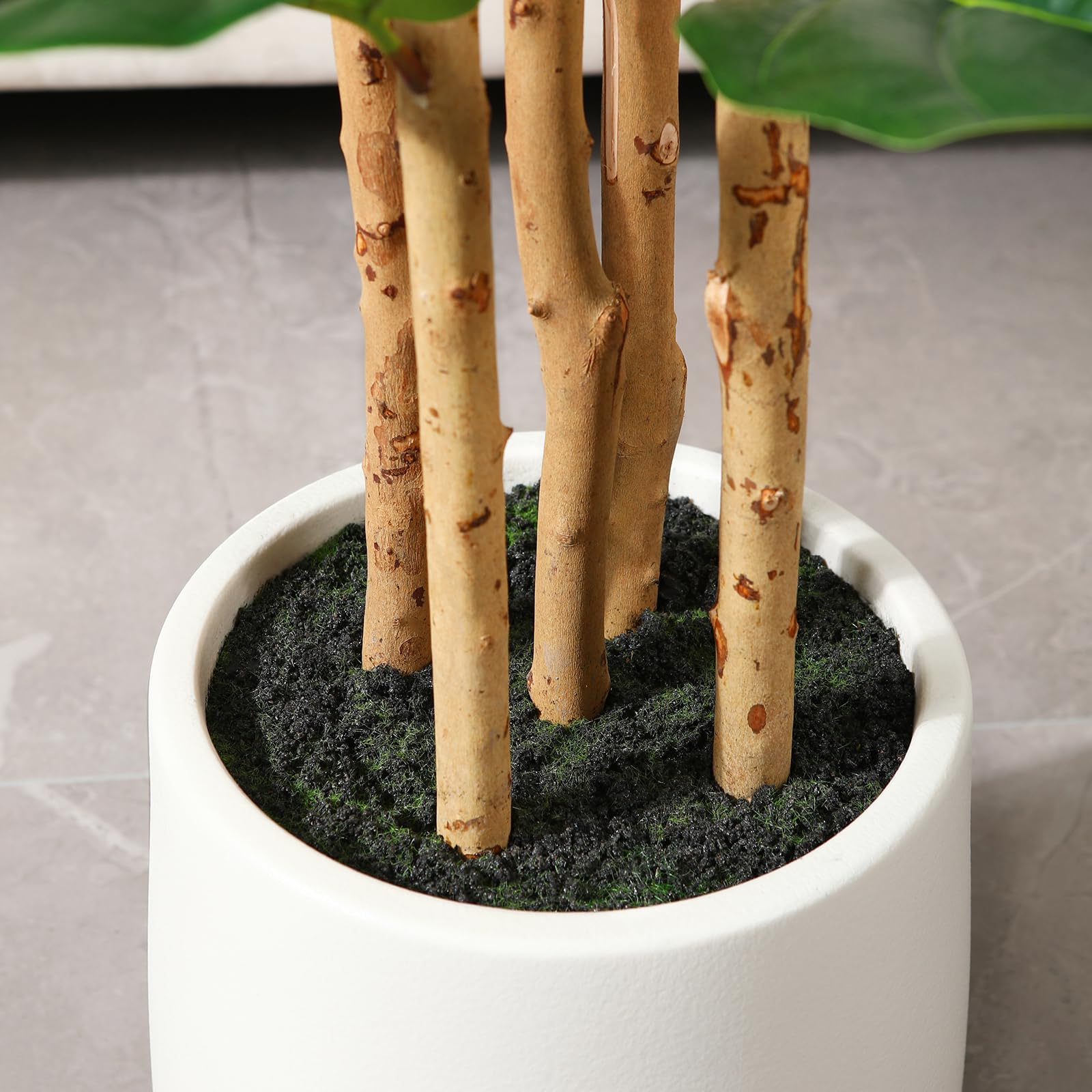 OAKRED tall faux tree suitable for living room or office decor.
