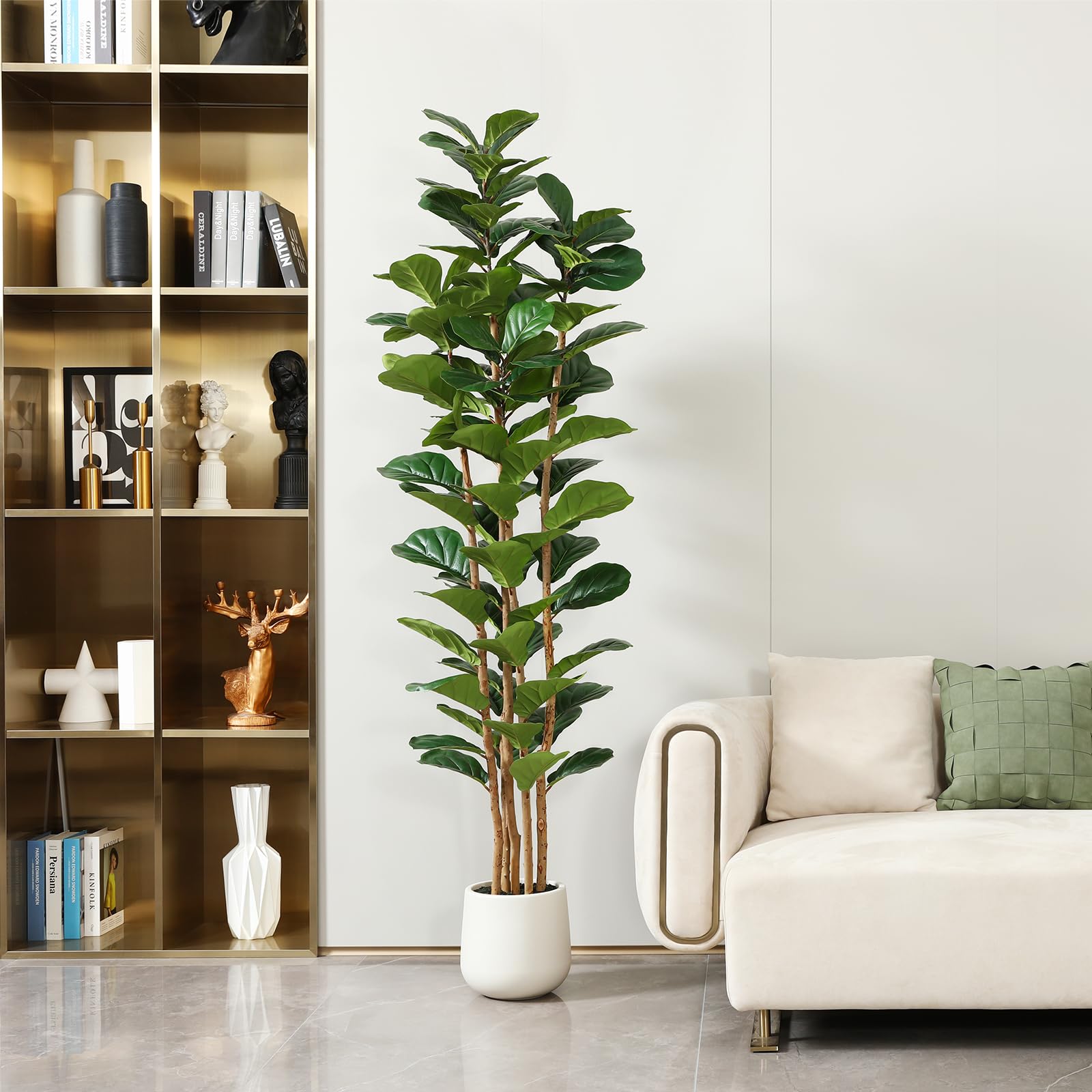 OAKRED natural wood trunk detail adds lifelike texture to faux tree.