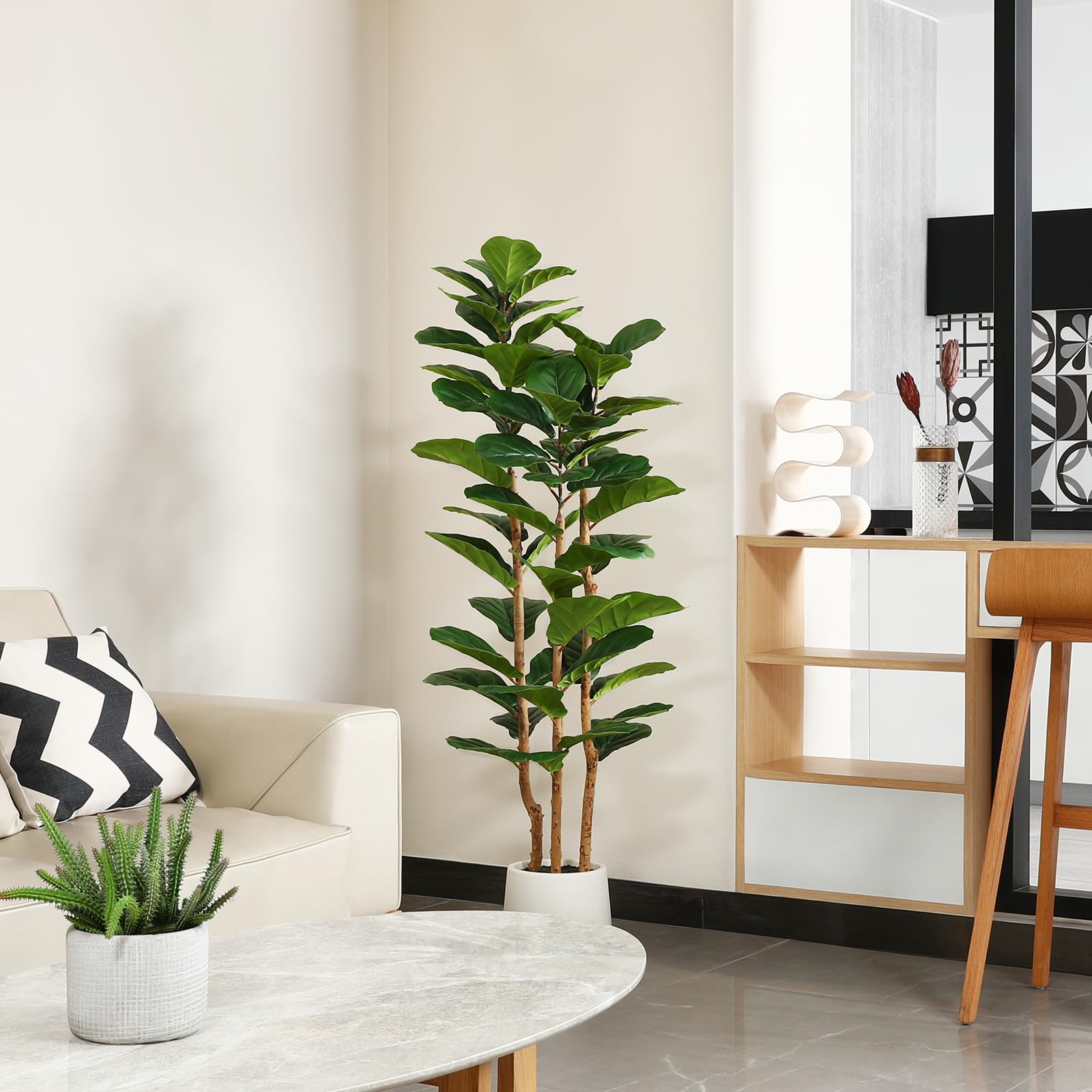 OAKRED white planter with artificial moss adds fullness and modern style.