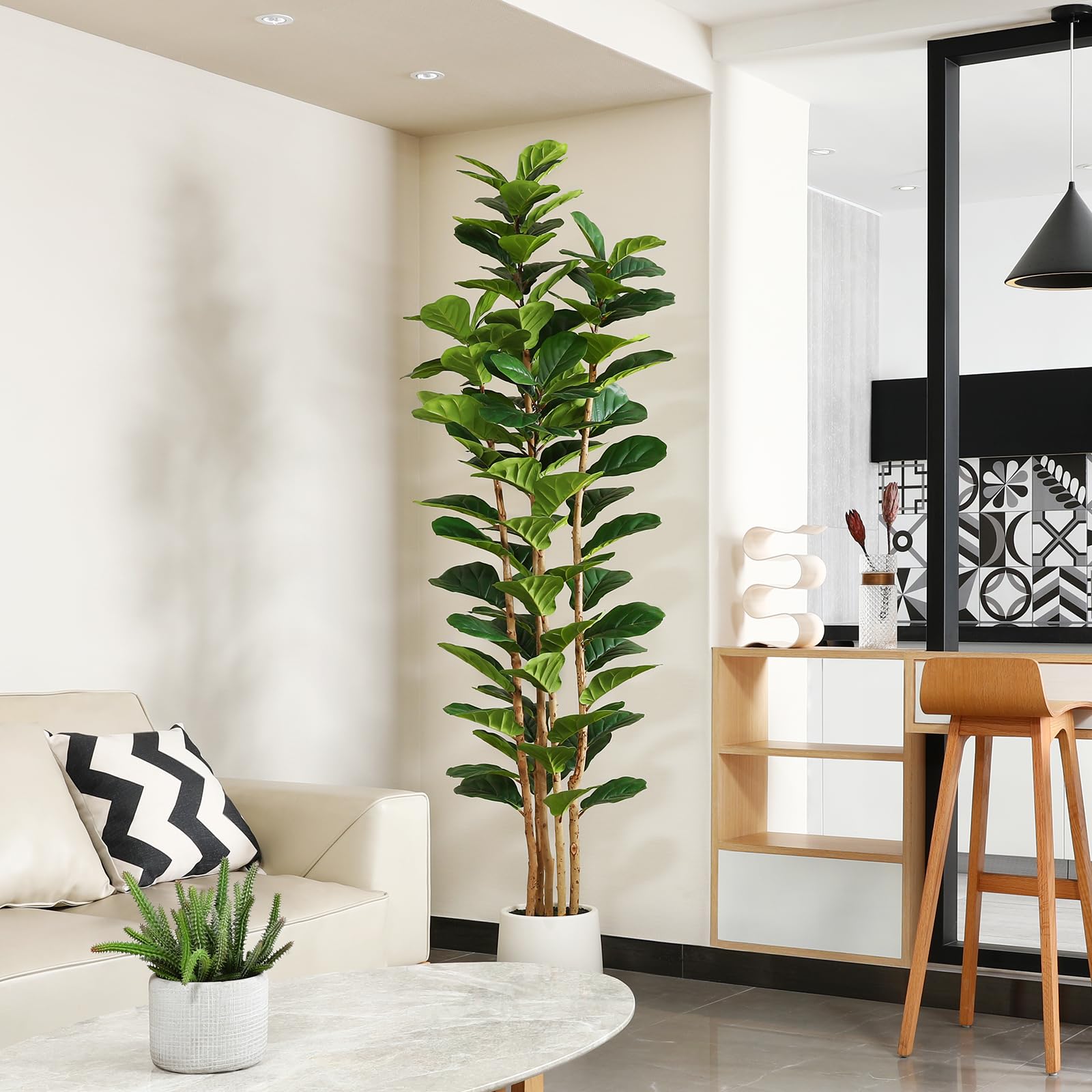 OAKRED white planter with faux moss creates fuller greenery.