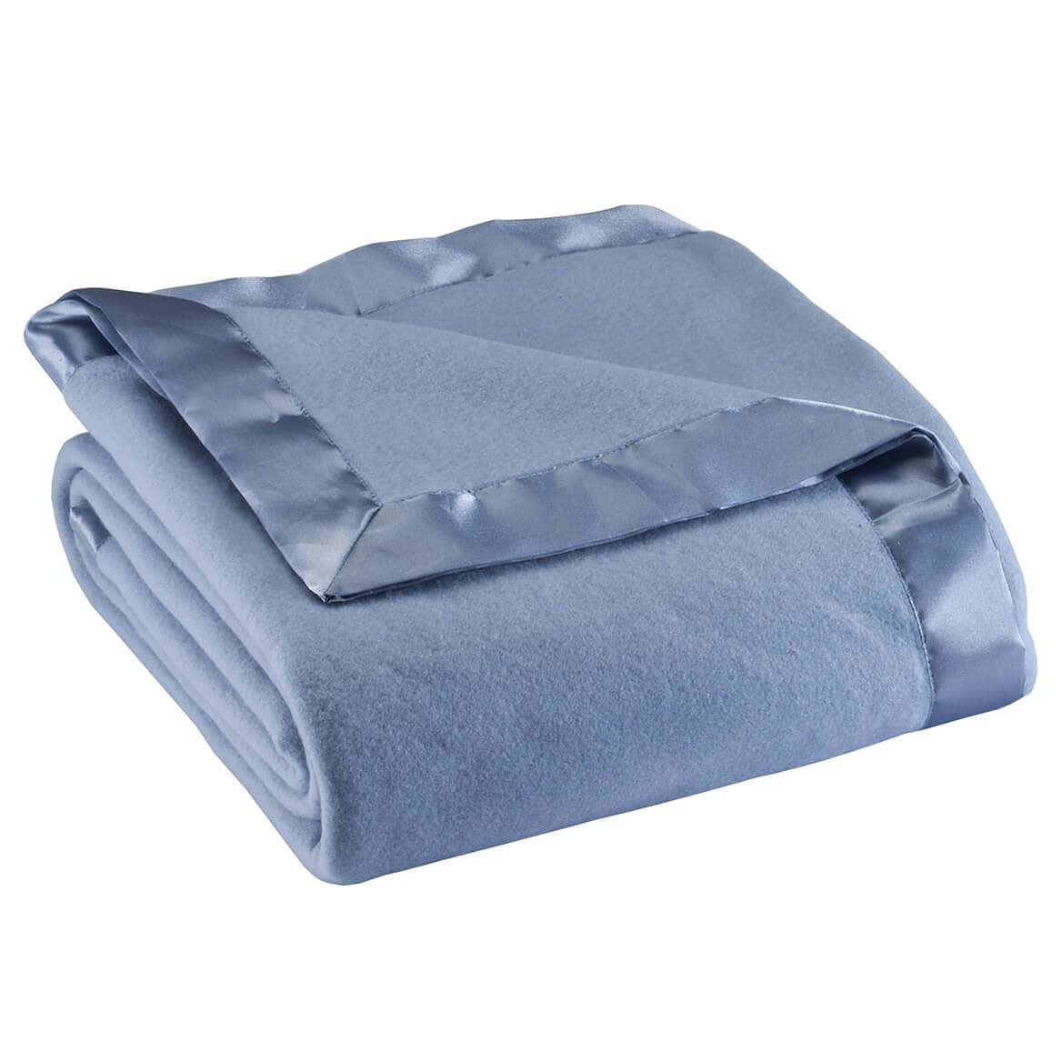 OakRidge satin fleece blanket folded to show plush warmth and travel-friendly portability