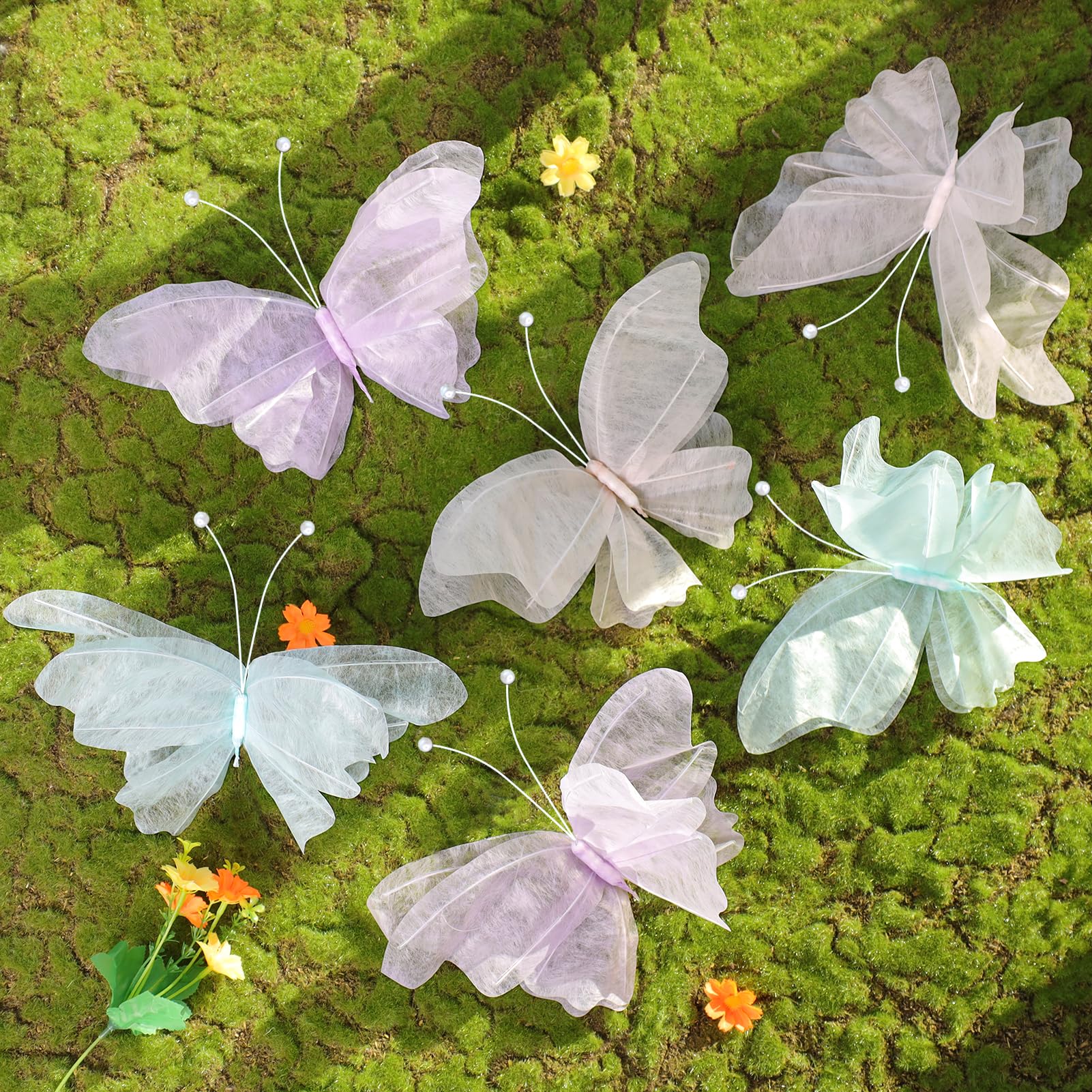 OBBOLO butterfly hanging decoration in pastel wings for garden party ambience.
