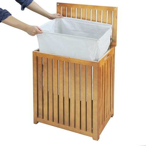 Oceanstar bamboo hamper includes canvas liner and wooden rods for easy handling.