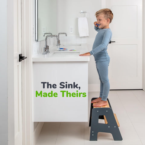OCODILE 2-Step Stool fits indoor spaces with a sleek gray finish.