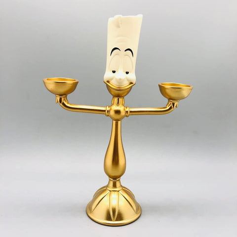 ocpcrn Beauty and the Beast candelabra at Christmas party table for festive glow