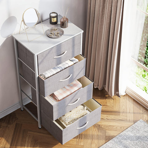 ODK small fabric-drawer dresser keeps blankets organized in tight spaces.