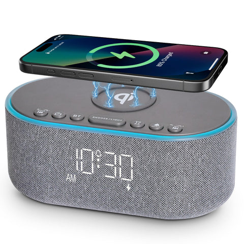 Odokee wireless charging alarm clock radio top view with clutter-free nightstand charging.