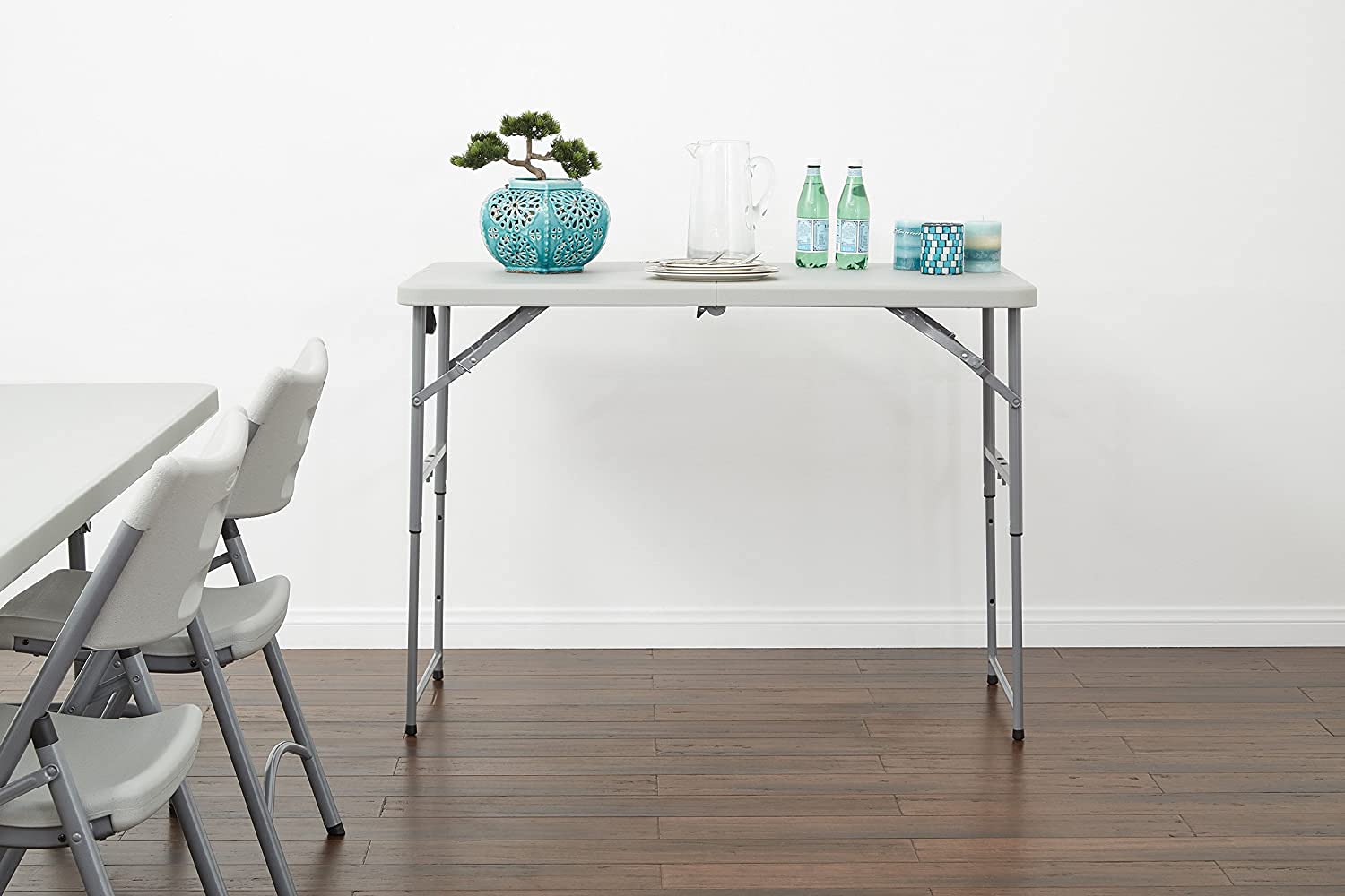 Office Star Resin Rectangle Table ready-to-use when stored, with foldable design.