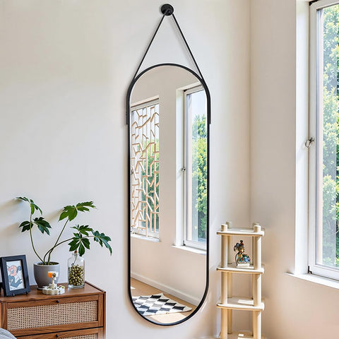 OGCAU hanging leather strap detail adds industrial chic and secure suspension.