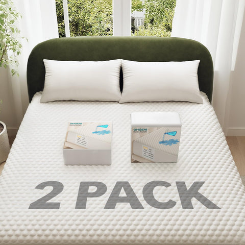 OhGeni waterproof mattress protector folded for compact storage and quick protection.