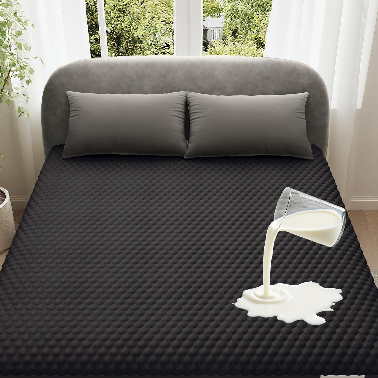 OhGeni waterproof mattress protector in queen size protecting surface from spills for dry nights