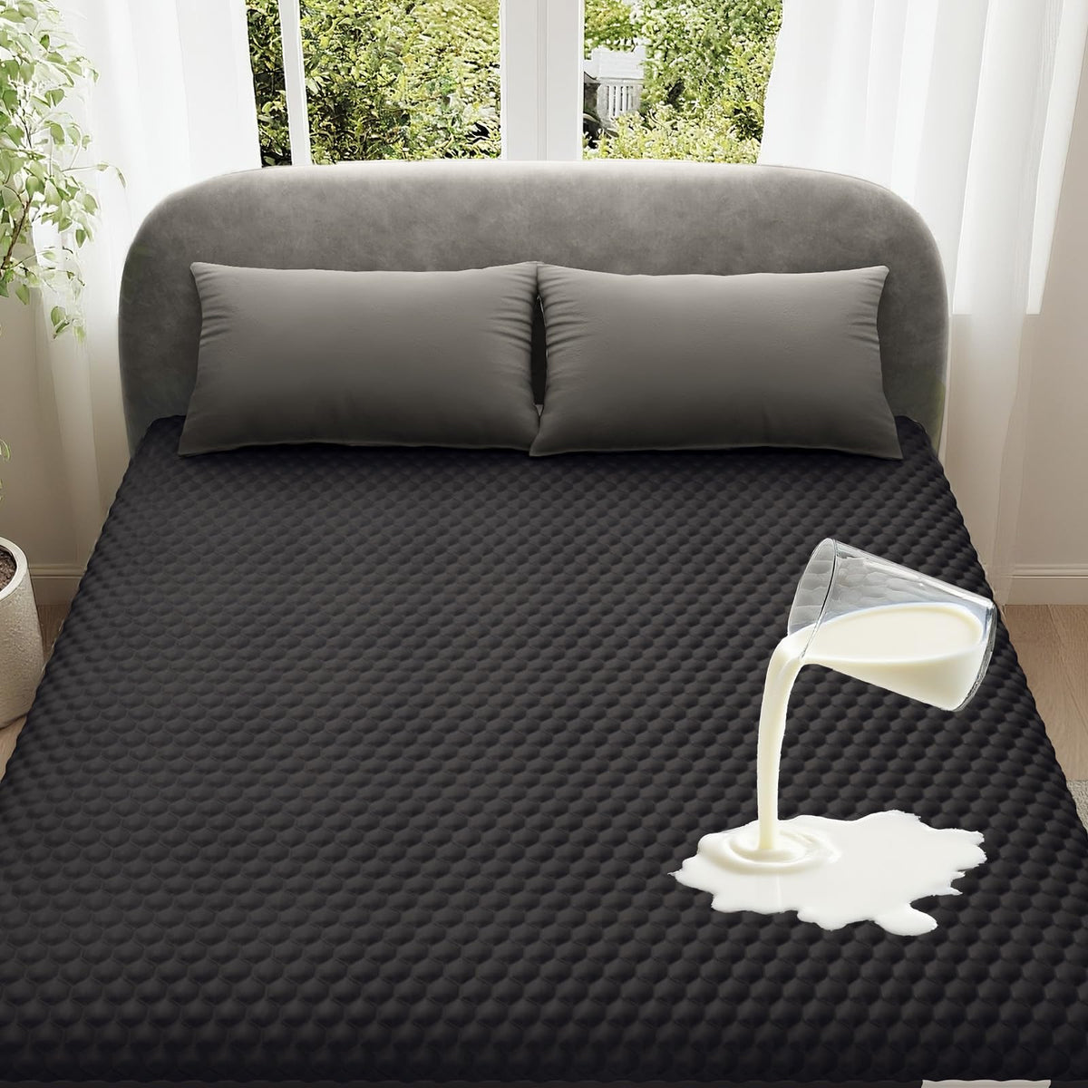 OhGeni waterproof mattress protector in queen size protecting surface from spills for dry nights