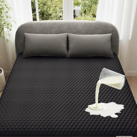 OhGeni waterproof mattress protector in queen size protecting surface from spills for dry nights