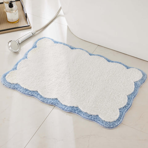 Ohocut luxury bath rug with white and blue scalloped piping adds plush style.