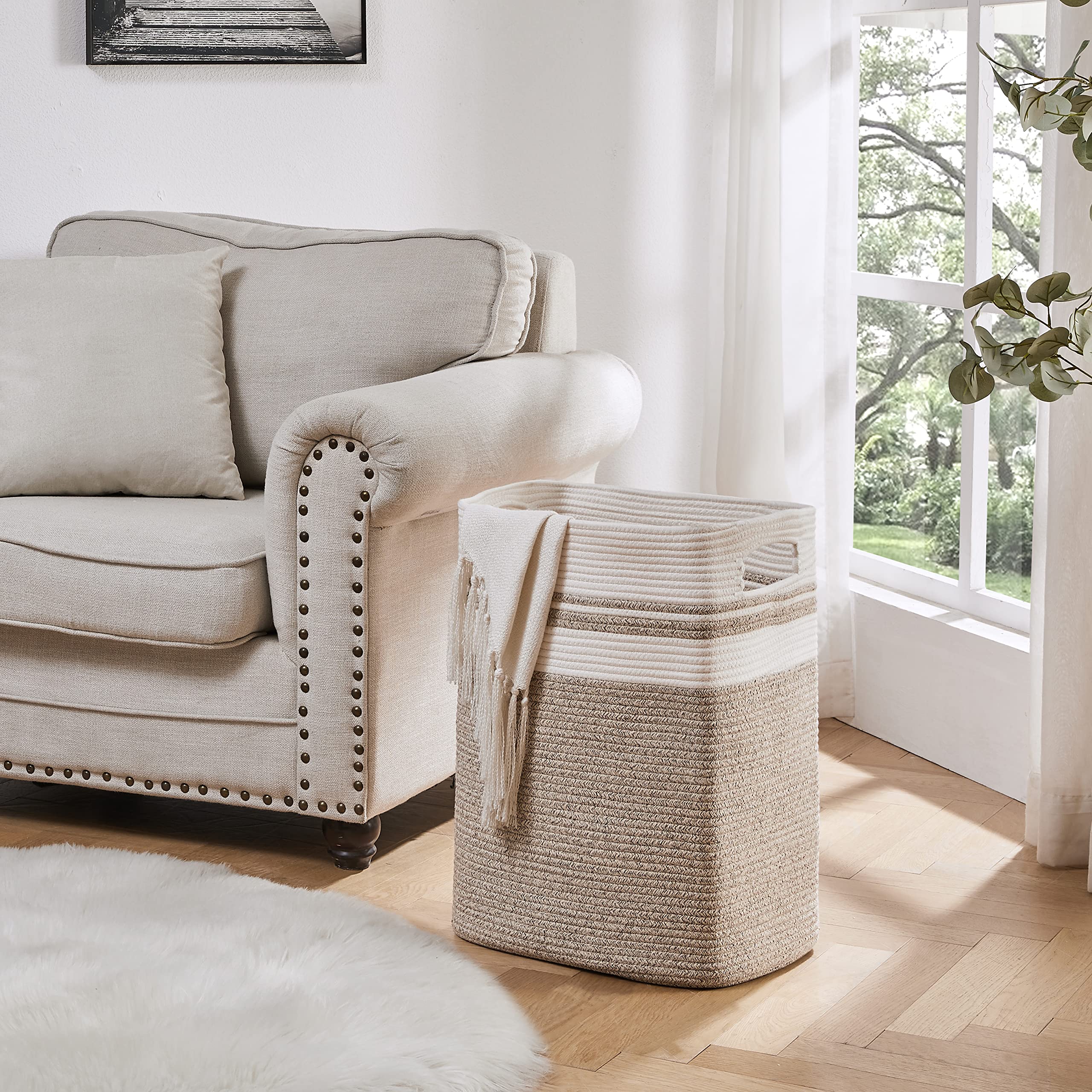 OIAHOMY cotton-rope storage basket with handles, durable for heavy laundry sessions.