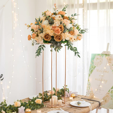 OIHYA rose gold cylinder stand showcases plants as a stylish dining accent.