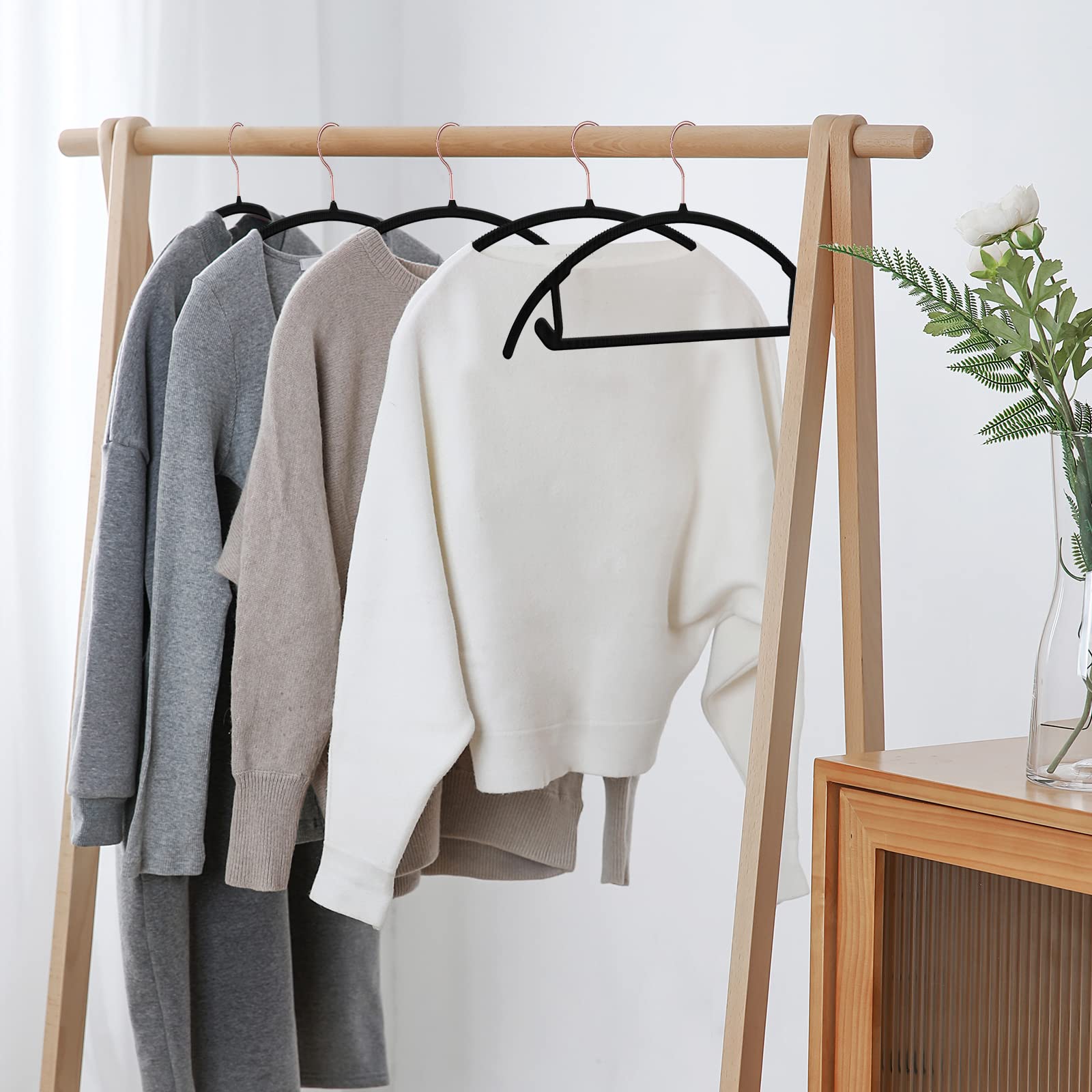 OIKA Hangers curved shoulder design reduces bumps on garments