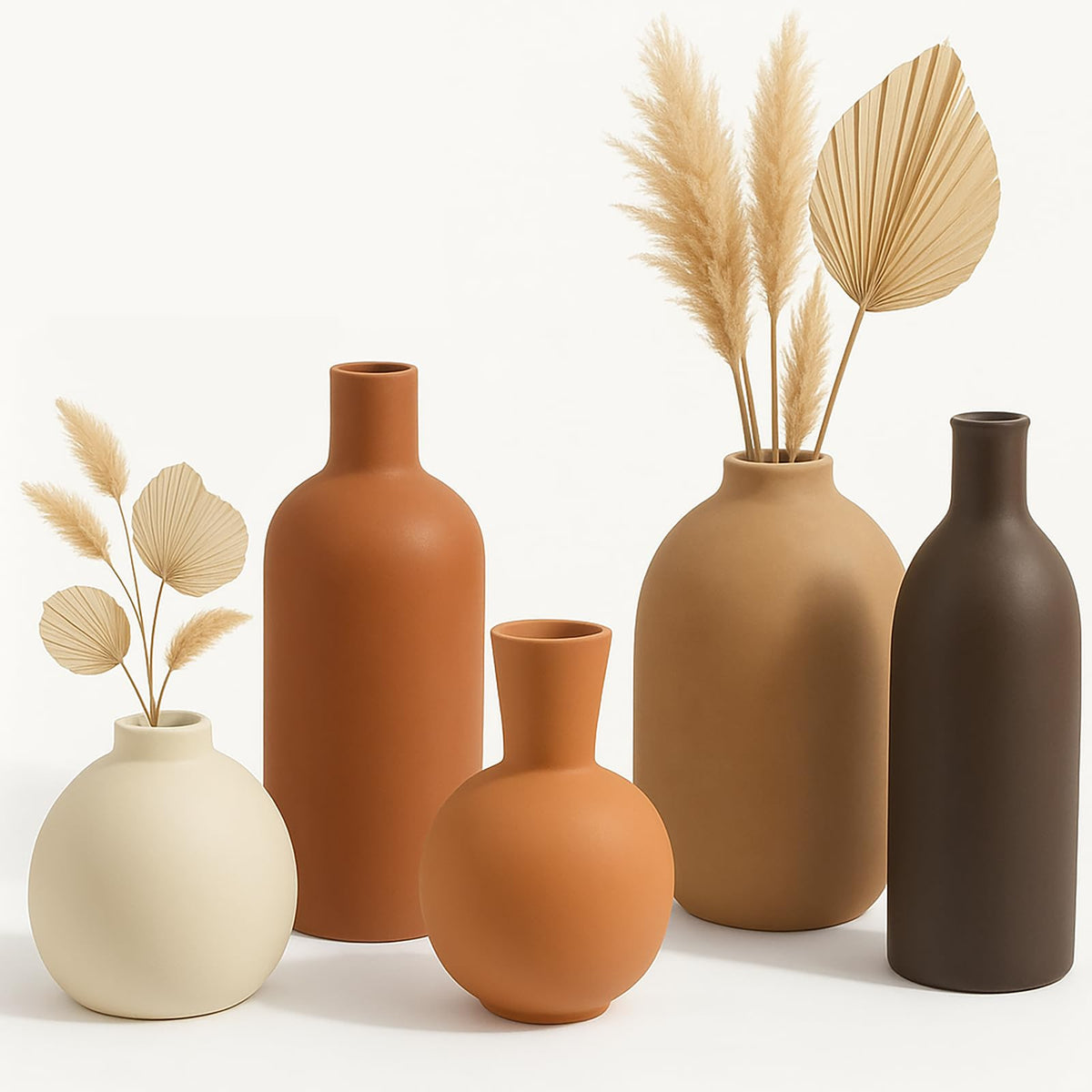 OLACHIKKO neutral vases on a coffee table adding subtle warmth to living spaces.