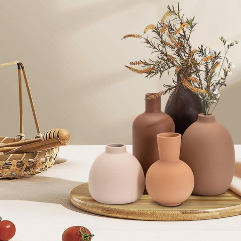 OLACHIKKO matte earth-tone vases on a shelf elevate Japandi-inspired decor.