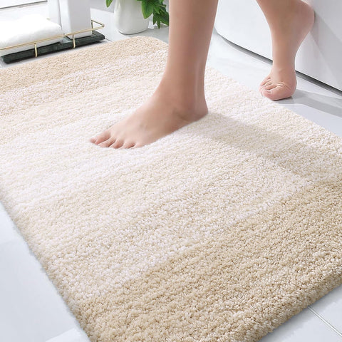 OLANLY bath mat with soft-pile texture for cozy feet and warmth.