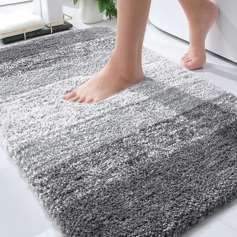 OLANLY bath mat 34x21 with plush microfiber provides cozy, warm feet after showers.