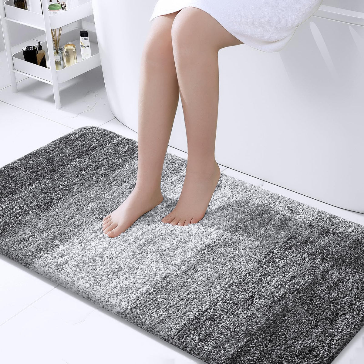 OLANLY bath mat with one-inch pile for extra softness and warmth underfoot.