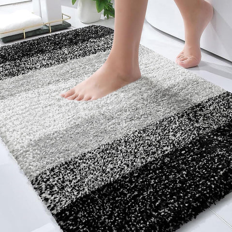 OLANLY bath rug with gradient stripe offers plush comfort and chic bathroom décor.