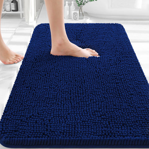 OLANLY bath rug navy 30x20 provides plush comfort and quick water absorption.