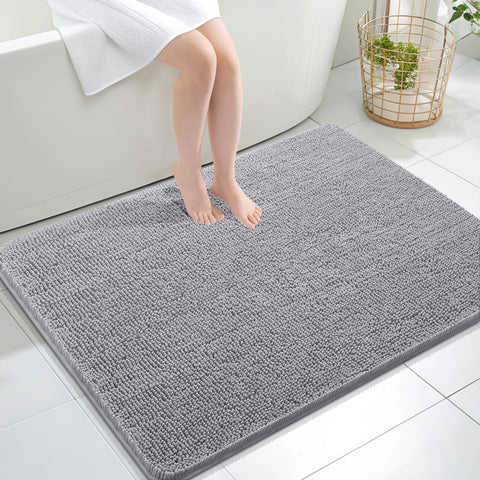 OLANLY bath rug with soft chenille pile for cozy feet after showers.