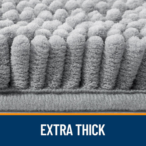 OLANLY bath rug with non-slip rubber backing for stable footing.