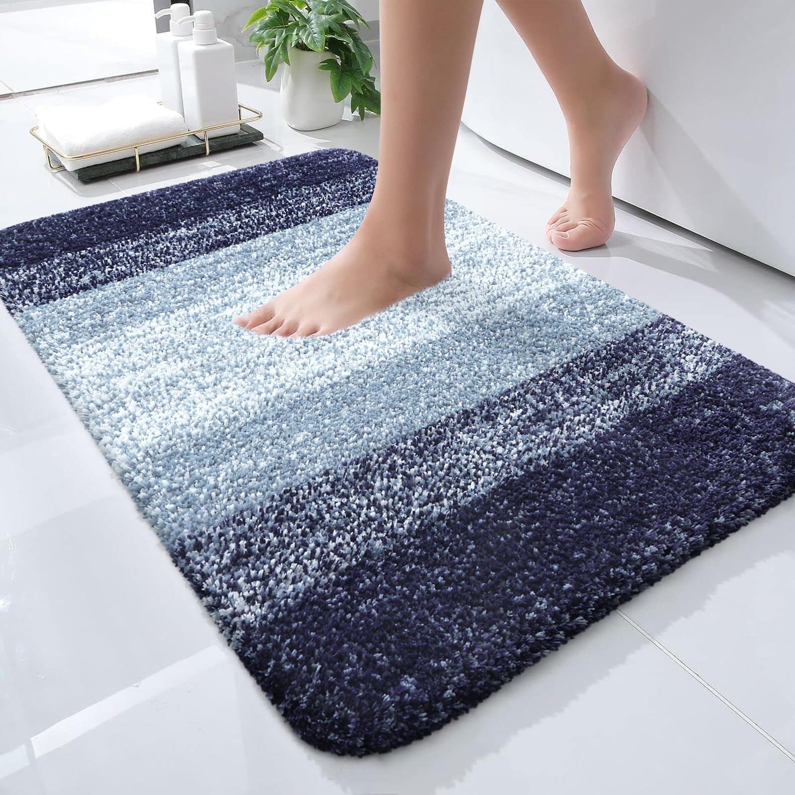 OLANLY small bath rug with plush pile delivers warm underfoot comfort