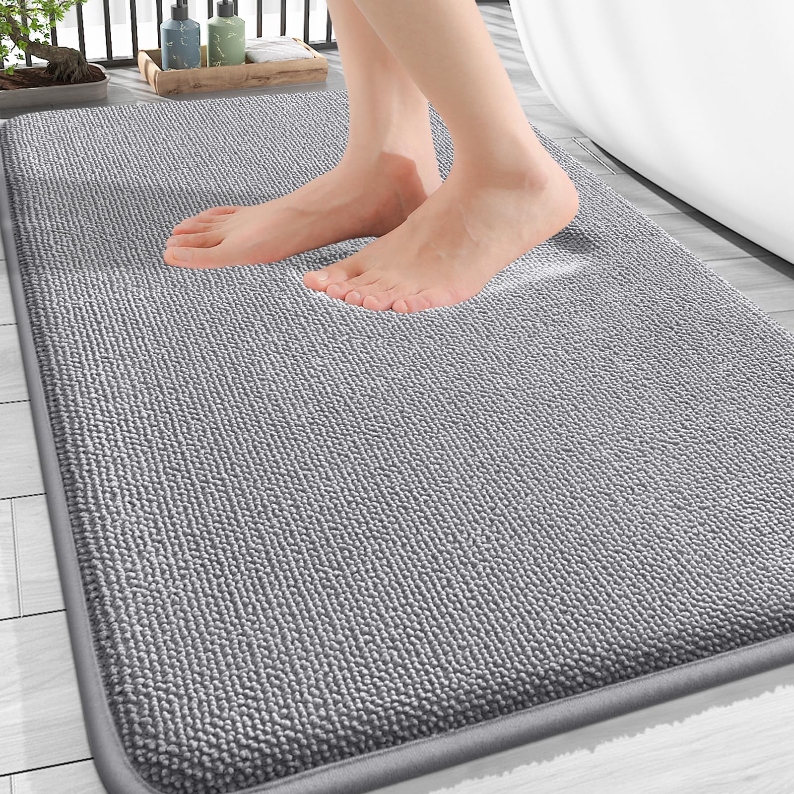 OLANLY thick memory foam bath mat by the tub offering cloud-like comfort
