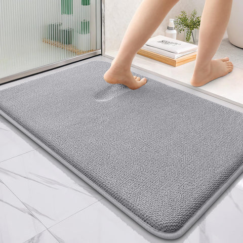 OLANLY thick memory foam bath mat gray for plush comfort after shower.