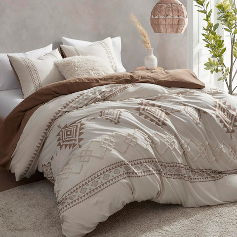 Oli Anderson king duvet cover in beige and terracotta blends neutral tones.